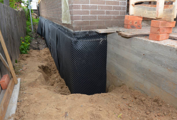 Happy homeowners after waterproofing job in Berkeley Heights